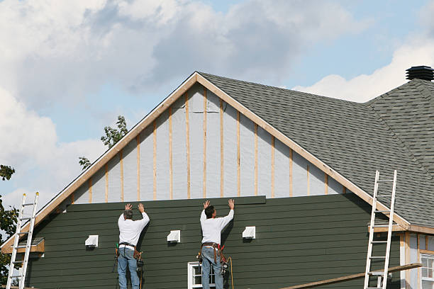 Professional Siding technician working in Monroeville, OH